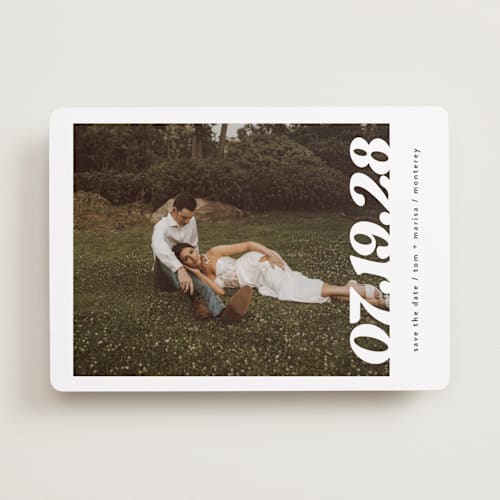 This is a pearl save the date with standard by Christie Garcia called sidele printing on recycled smooth signature in standard