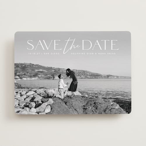 This is a moonstone save the date with standard by Olivia Raufman called breathtaking printing on recycled smooth signature in standard