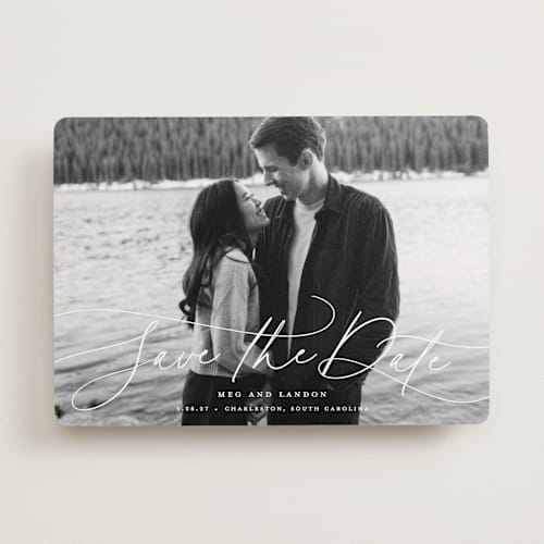 This is a snowfall save the date with standard by Lauren Chism called subtle rise printing on recycled smooth signature in standard