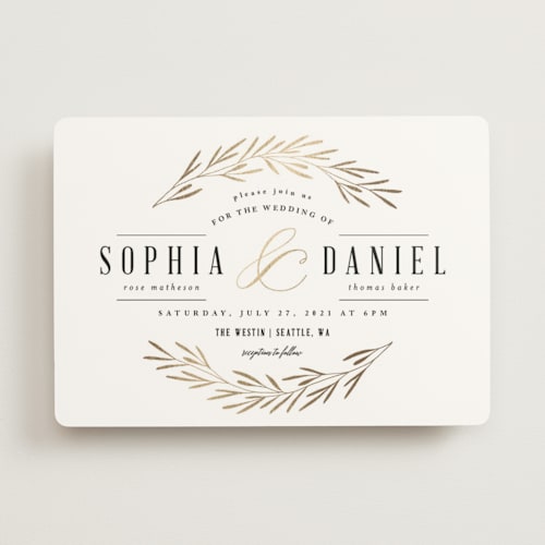 This is a classic white foil stamped wedding invitations with foil pressed by Kelly Schmidt called gilded leaves printing on signature in standard