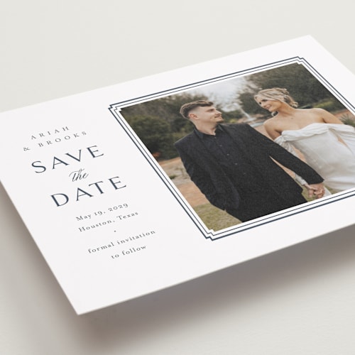 This is a french blue save the date with standard by Jennifer Postorino called ariah printing on recycled smooth signature in grand