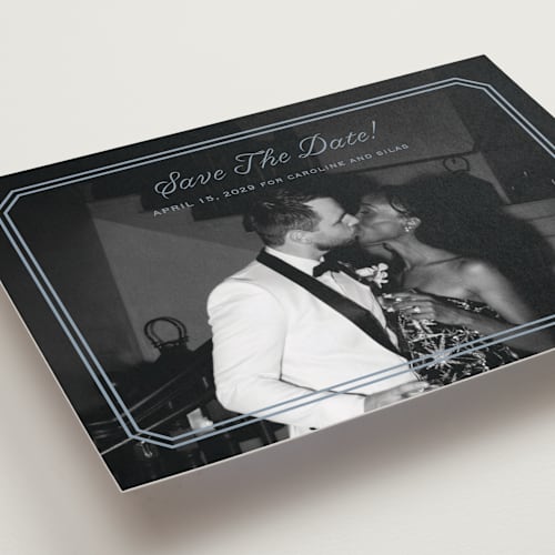 This is a french blue save the date with standard by Carolyn MacLaren called bevel monogram printing on recycled smooth signature in grand