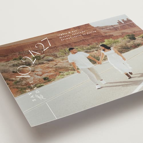This is a pearl save the date with standard by Brooke Chandler called curved date printing on recycled smooth signature in grand