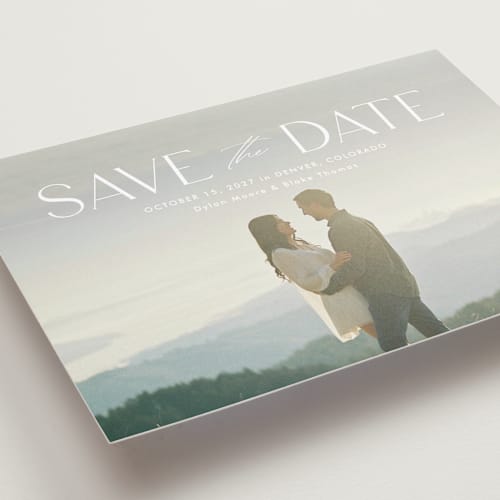 This is a cloud save the date with standard by Kate Ahn called monterosso printing on recycled smooth signature in grand