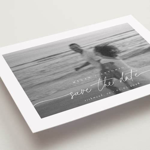 This is a ivory save the date with standard by Pippa Shaw called gaussian printing on recycled smooth signature in grand