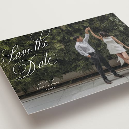 This is a pearl save the date with standard by Pixel and Hank called enamored printing on recycled smooth signature in grand