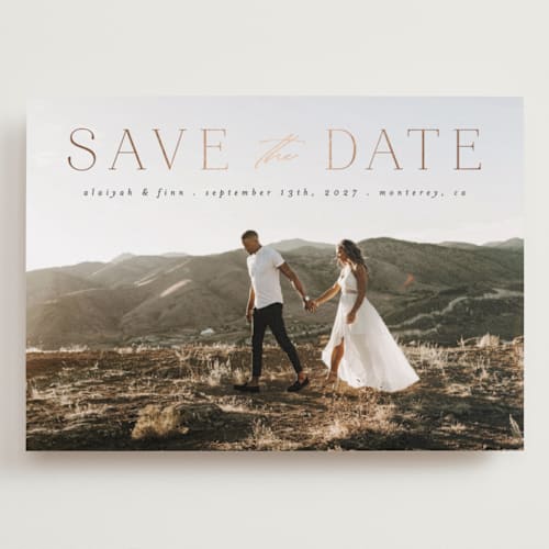 This is a charcoal foil stamped save the date cards with foil pressed by Morgan Kendall called classic lettering printing on recycled smooth signature in grand