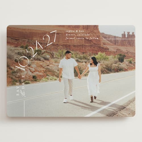 This is a pearl save the date with standard by Brooke Chandler called curved date printing on recycled smooth signature in grand