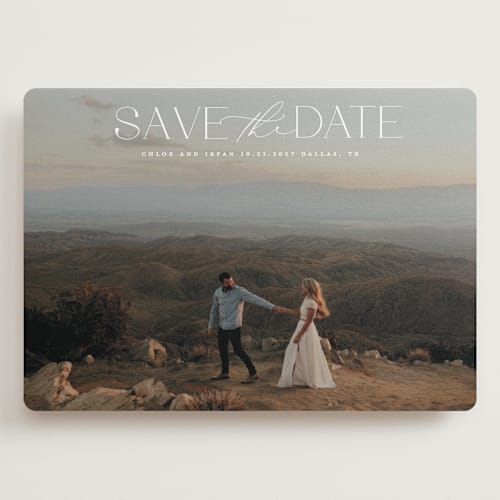 This is a ivory save the date with standard by Maja Cunningham called prose printing on recycled smooth signature in grand