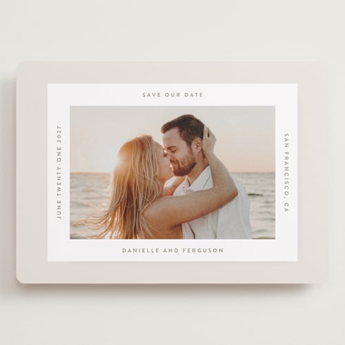 This is a ivory save the date with standard by Tamara Hilje called horizonte printing on recycled smooth signature in grand