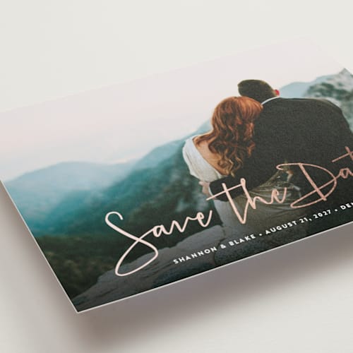 This is a winter petite save the dates with foil pressed by Hooray Creative called stylish script printing on recycled smooth signature in petite