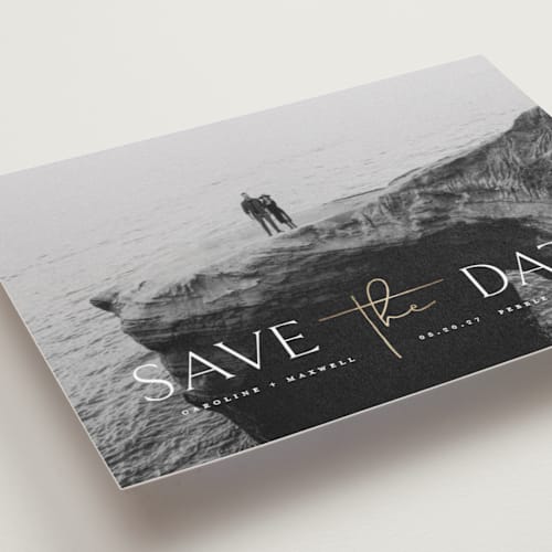 This is a snow petite save the dates with foil pressed by Erin Deegan called the date printing on recycled smooth signature in petite