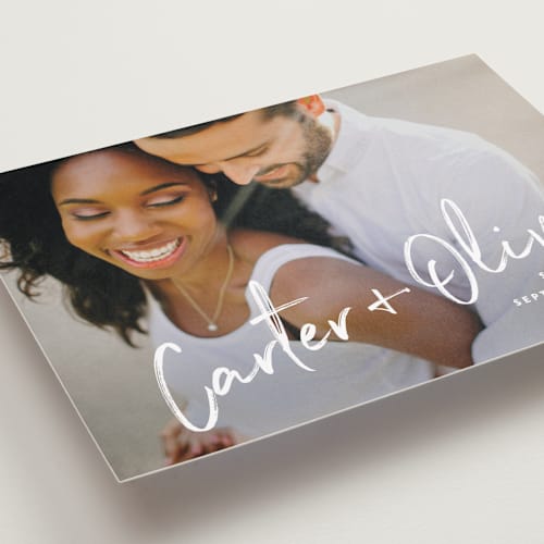 This is a pearl petite save the dates with standard by Owl and Toad called signature printing on recycled smooth signature in petite