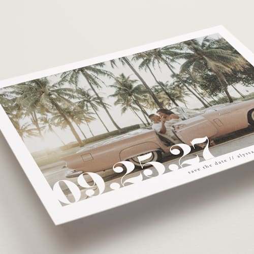 This is a linen petite save the dates with standard by Ashley Cuccio called malibu dreams printing on recycled smooth signature in petite