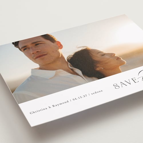 This is a onyx petite save the dates with standard by Mansi Verma called eternal flame printing on recycled smooth signature in petite