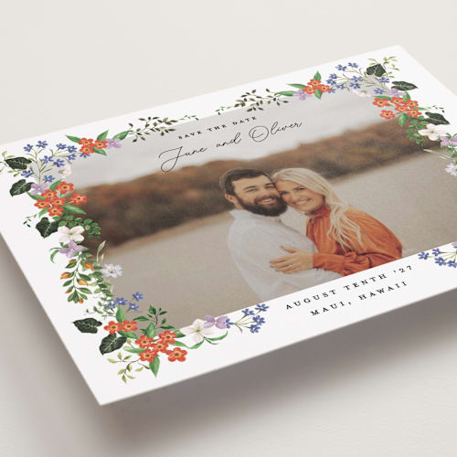 This is a lotus petite save the dates with standard by Sarah Knight called tropicana printing on recycled smooth signature in petite