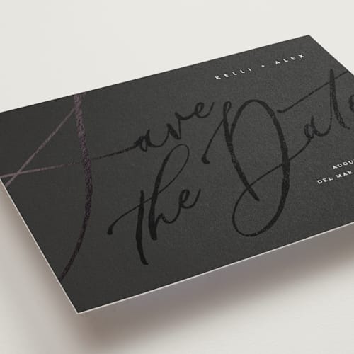 This is a noir petite save the dates with foil pressed by Eric Clegg called brush script printing on signature in petite