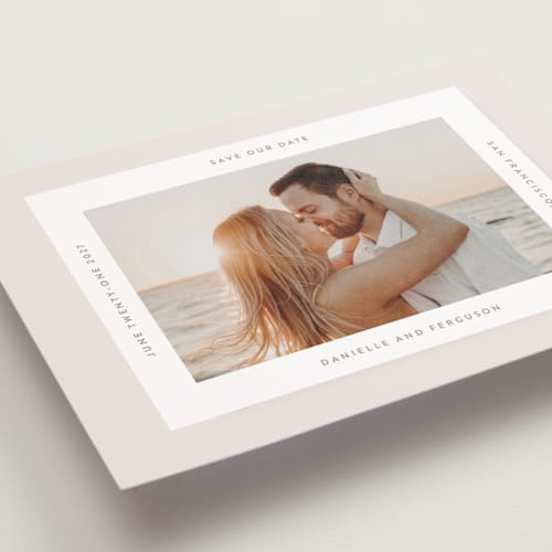 This is a ivory save the date postcards with standard by Tamara Hilje called horizonte printing on signature in postcard