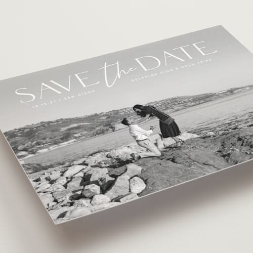 This is a moonstone save the date postcards with standard by Olivia Raufman called breathtaking printing on signature in postcard