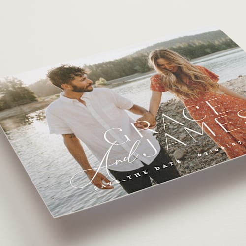 This is a snow save the date postcards with standard by Angela Thompson called namesake printing on signature in postcard