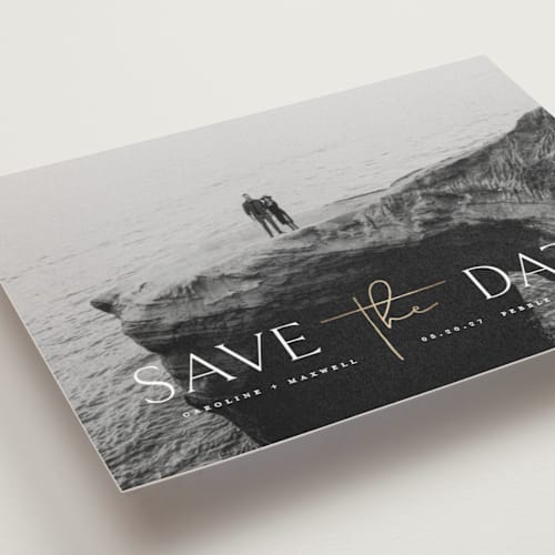 This is a snow save the date postcards with foil pressed by Erin Deegan called the date printing on signature in postcard