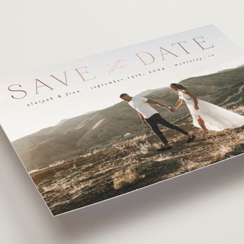 This is a charcoal save the date postcards with foil pressed by Morgan Kendall called classic lettering printing on signature in postcard