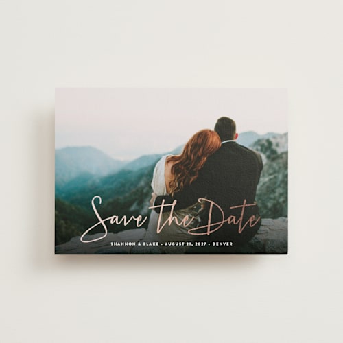 This is a winter petite save the dates with foil pressed by Hooray Creative called stylish script printing on recycled smooth signature in petite