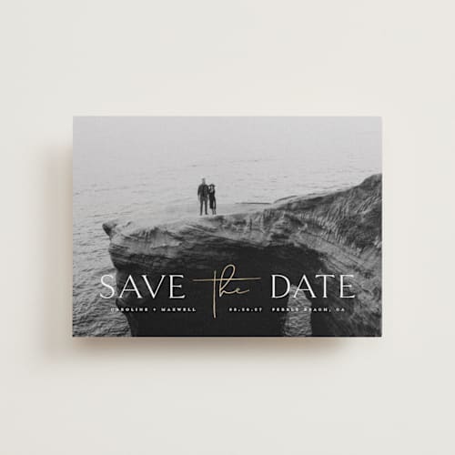 This is a snow petite save the dates with foil pressed by Erin Deegan called the date printing on recycled smooth signature in petite