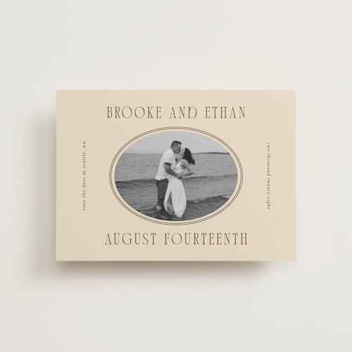 This is a buttercream petite save the dates with standard by Angela Garrick called ethan printing on recycled smooth signature in petite