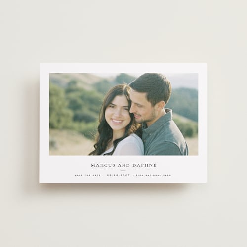 This is a ink petite save the dates with standard by Wildfield Paper Co called daisies printing on recycled smooth signature in petite