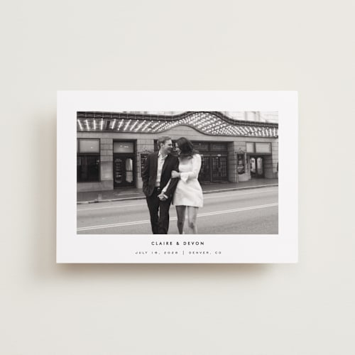This is a silk petite save the dates with standard by Kelly Schmidt called framed minimalist printing on recycled smooth signature in petite