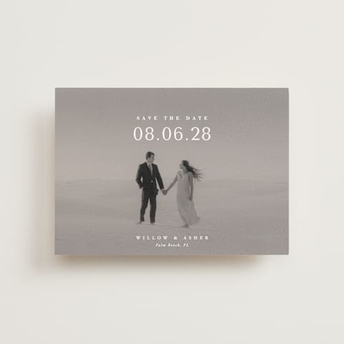 This is a moonstone petite save the dates with standard by Lucrecia Caporale called classic big date printing on recycled smooth signature in petite