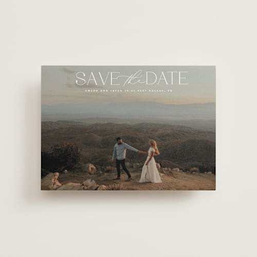 This is a ivory save the date postcards with standard by Maja Cunningham called prose printing on signature in postcard