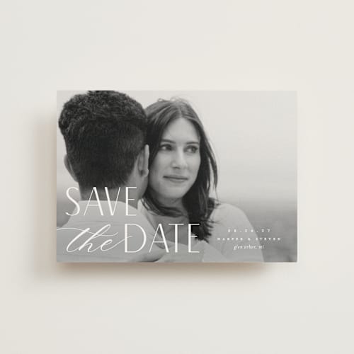 This is a snow save the date postcards with standard by Pixel and Hank called yours forever printing on signature in postcard