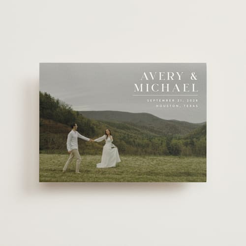 This is a ivory save the date postcards with standard by Juneau Designs called hold tight printing on signature in postcard