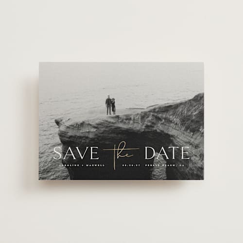 This is a snow save the date postcards with foil pressed by Erin Deegan called the date printing on signature in postcard