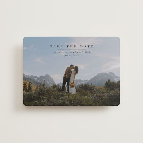 This is a midnight petite save the dates with standard by Abi de Leon called magical printing on recycled smooth signature in petite