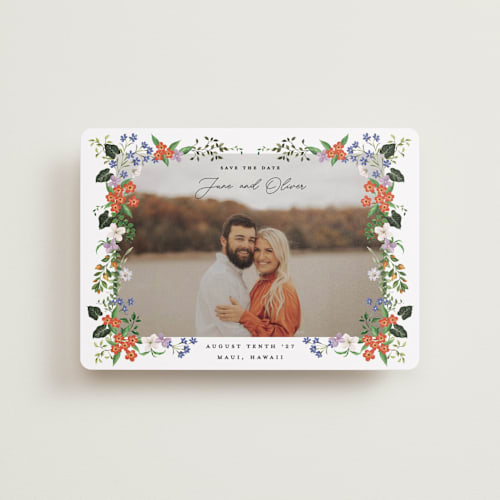 This is a lotus petite save the dates with standard by Sarah Knight called tropicana printing on recycled smooth signature in petite
