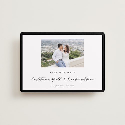 This is a onyx petite save the dates with standard by Devika Keskar called main event printing on recycled smooth signature in petite