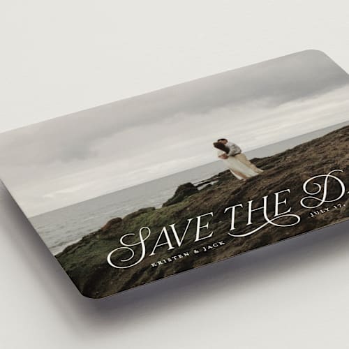 This is a porcelain save the date magnets with standard by Sarah Brown called story book printing on magnet paper in magnet