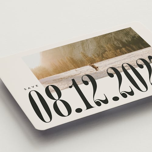 This is a ecru save the date magnets with standard by Jackie Crawford called big bold date printing on magnet paper in magnet