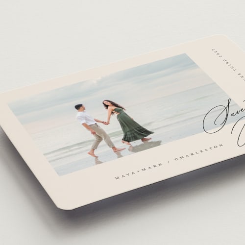 This is a cream save the date magnets with standard by Lori Wemple called posted printing on magnet paper in magnet