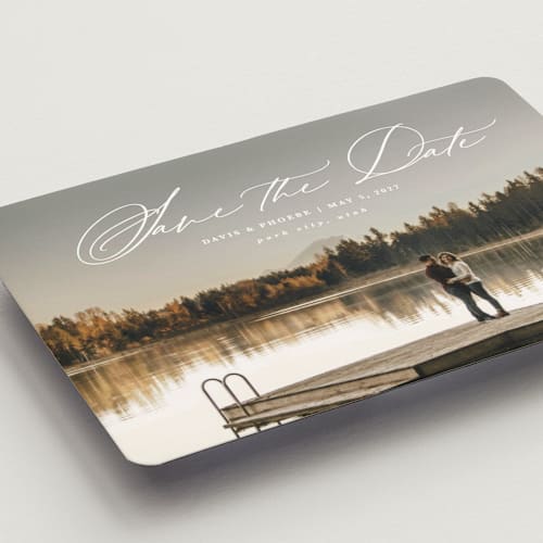 This is a cloud save the date magnets with standard by Kate Ahn called venice printing on magnet paper in magnet