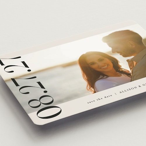 This is a ivory save the date magnets with standard by Pixel and Hank called all stacked up printing on magnet paper in magnet
