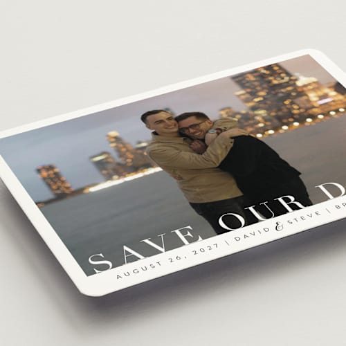 This is a clouds save the date magnets with standard by Kasia Labocki called simple elegance printing on magnet paper in magnet
