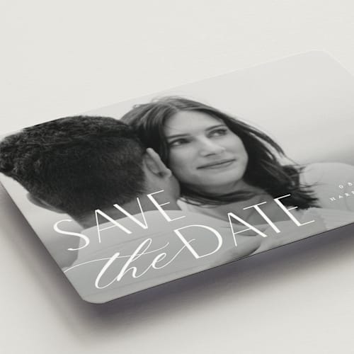 This is a snow save the date magnets with standard by Pixel and Hank called yours forever printing on magnet paper in magnet
