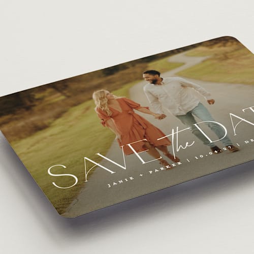 This is a pearl save the date magnets with standard by Jessica Corliss called simple elegance printing on magnet paper in magnet