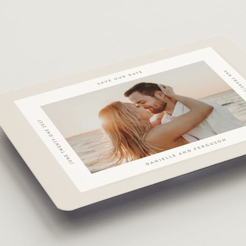 This is a ivory save the date magnets with standard by Tamara Hilje called horizonte printing on magnet paper in magnet