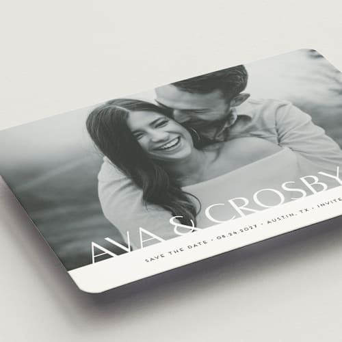 This is a obsidian save the date magnets with standard by Jennifer Postorino called bold names printing on magnet paper in magnet