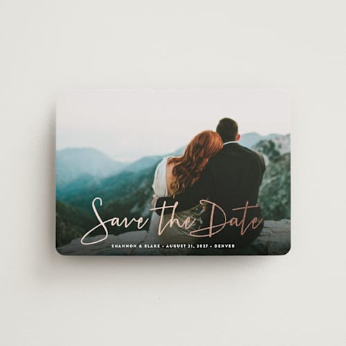 This is a winter save the date magnets with foil pressed by Hooray Creative called stylish script printing on magnet paper in magnet